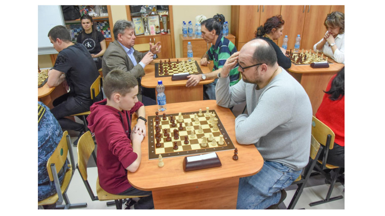 Любительский турнир по шахматам и шашкам.